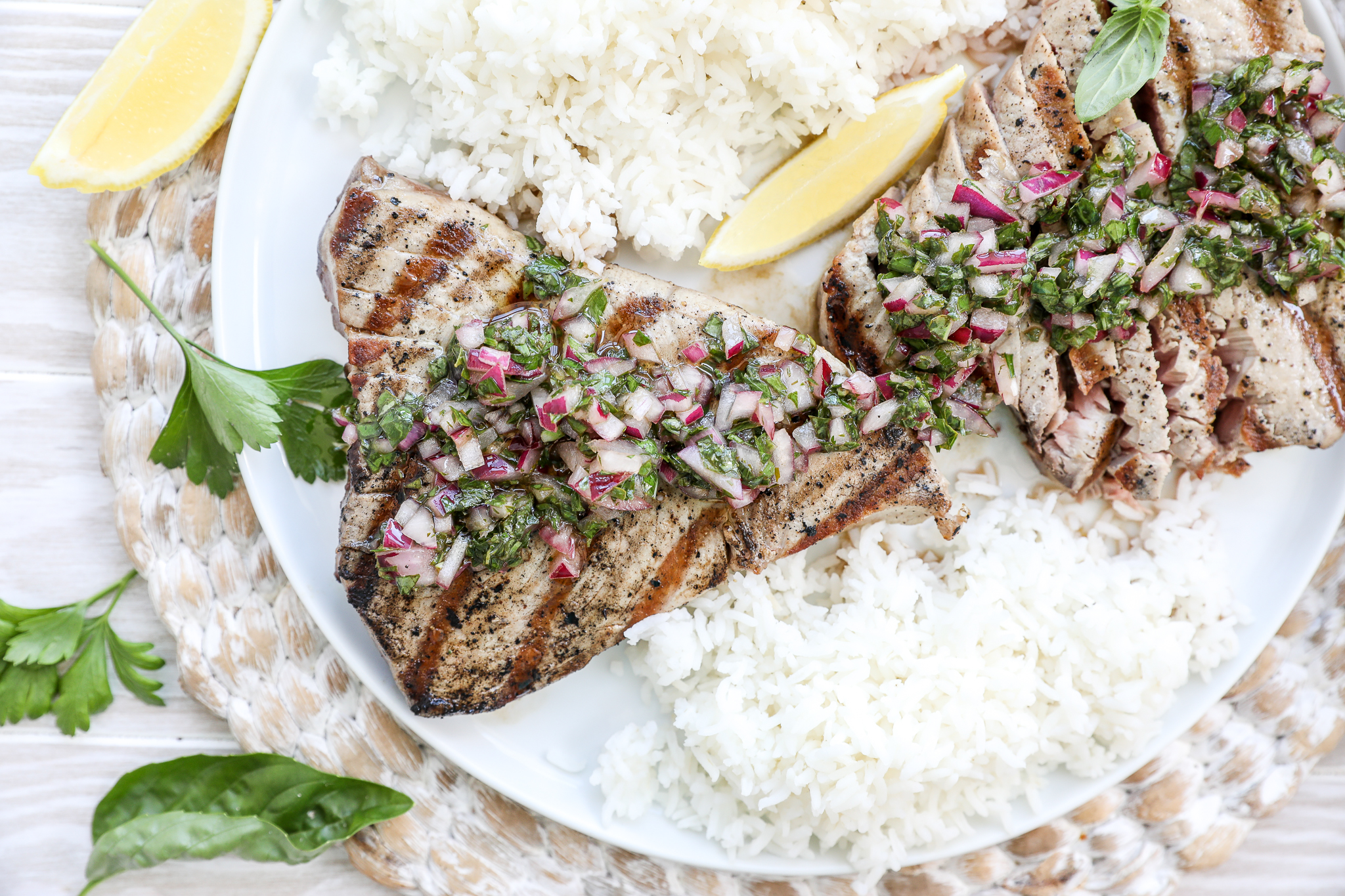 An image of grilled tuna with chimichurri sauce