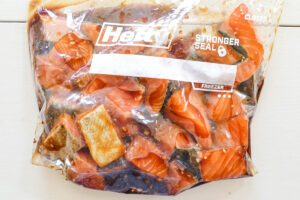 Salmon marinating in a ziplocak bag