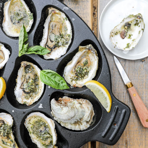 An overhead image of grilled oysters