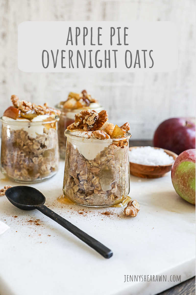 A PIN for a recipe for apple pie overnight oats. An image of apple pie overnight oats in small jars topped with yogurt, walnuts and apples. 