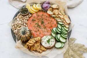 An overhead image of a smoked salmon board.