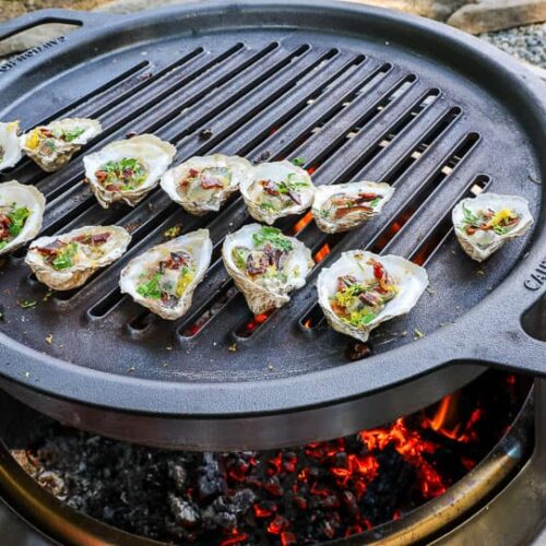 An image of oysters grilling