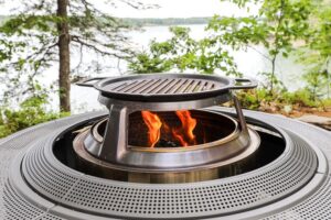 An image of a fire pit with a grill pan on top.