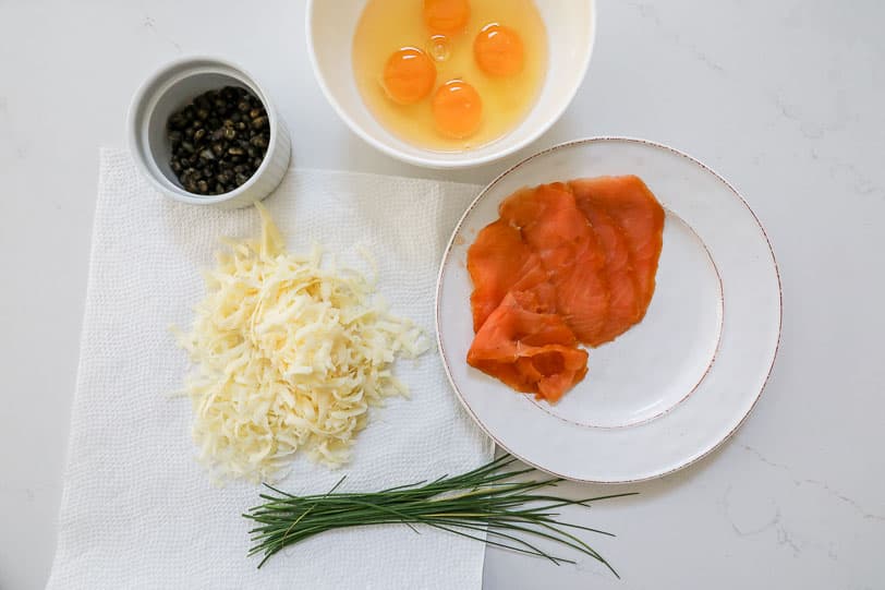 An image of ingredients needed to make smoked salmon with eggs. 