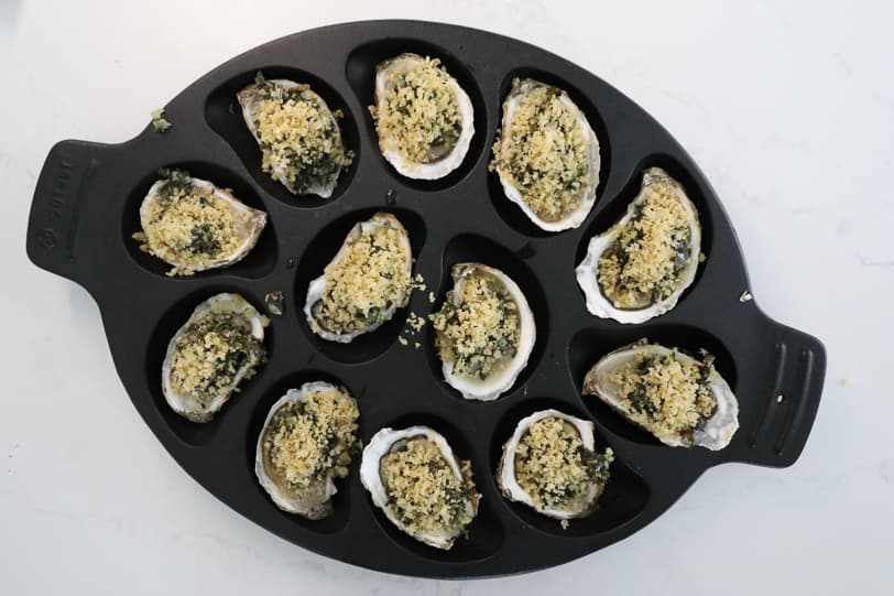 An overhead image of oysters topped with panko crumbs.