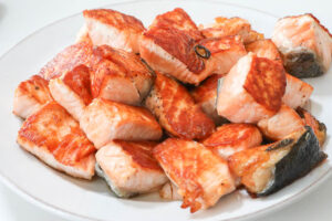 An image of pan seared salmon bites.